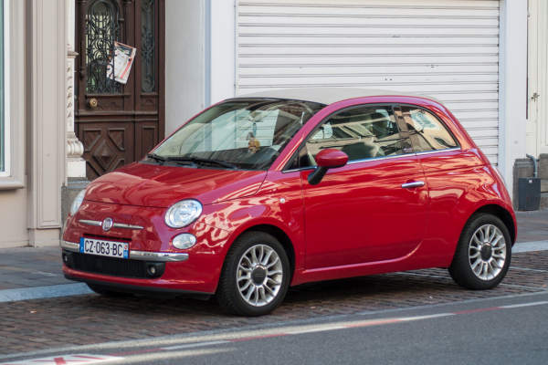 Fiat 500 parked on road