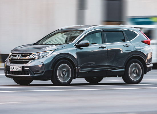 grey honda cr-v on road