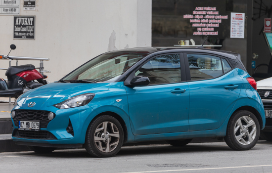 blue hyundai i10 parked on road