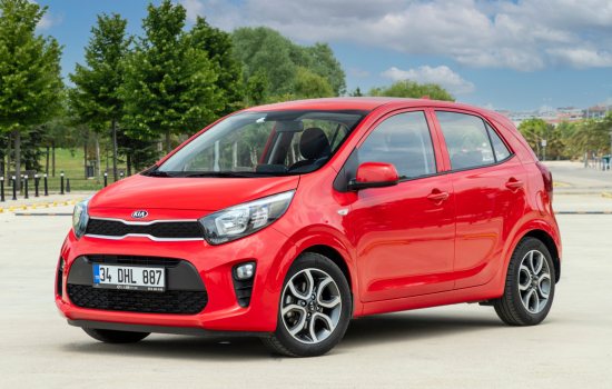 red kia picanto parked 