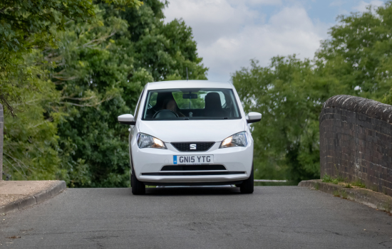 white seat mii on bridge