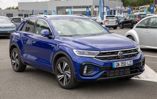 blue volkswagen t-roc in garage carpark