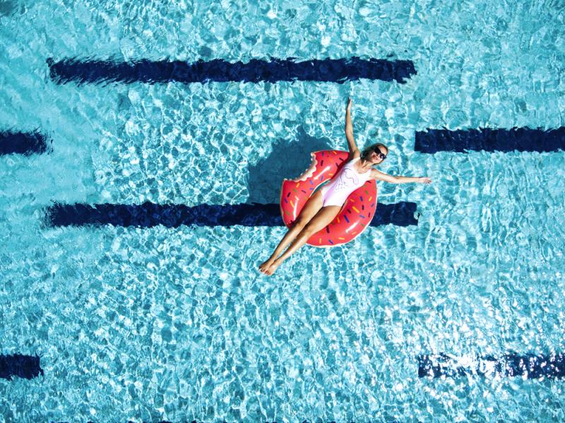 woman-in-pool-on-inflatable-ring