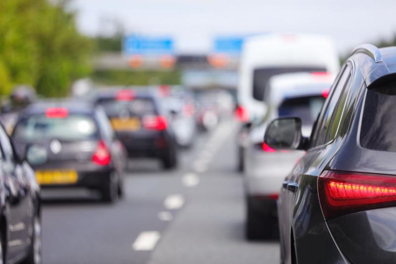 Motorway with multiple cars on it